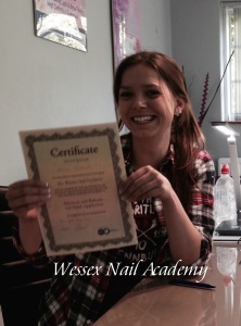 Emma proudly showing off her Gel Polish Certificate. 