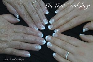 Anna and her Mum's wedding nails. Gel II French with bridal stamping