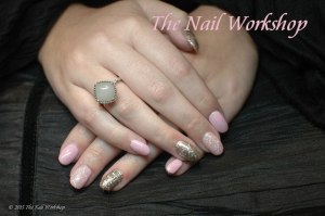 Shellac pink with baby pink glitter and gold holographic glitter.